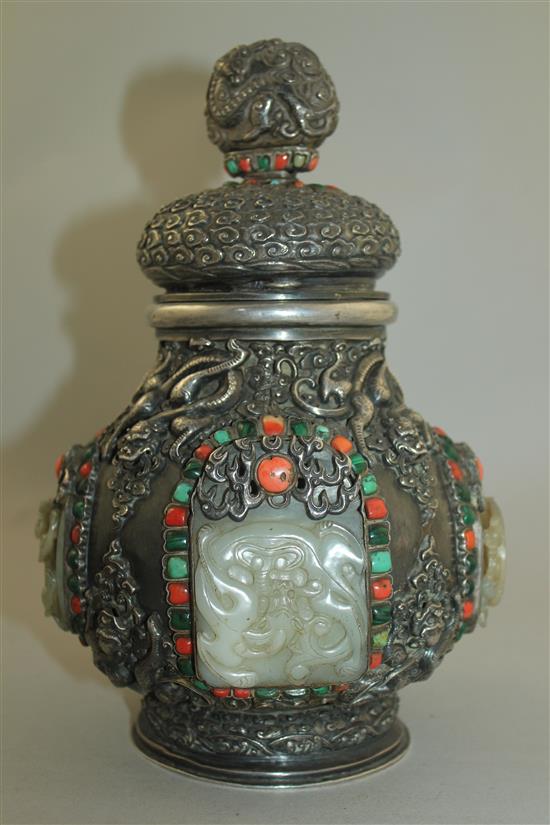 A Tibetan silver, jade, coral, malachite and turquoise mounted ritual jar and cover, 19th century, 25.5cm